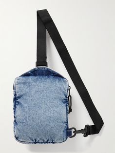 The compact shape of Balenciaga's 'Explorer' messenger bag makes it ideal for your errands or weekend adventures. Printed with the brand's emblem across the front, it's made from denim and has two zipped compartments. Change up the styling and wear it on both your front and back. Nylon Rectangular Bag With Zipper Pocket, Rectangular Nylon Bag With Zipper Pocket, Rectangular Nylon Bags With Zipper Pocket, Luxury Nylon Crossbody Bag, Luxury Nylon Bags With Logo Patch, Rectangular Nylon Shoulder Bag With Removable Pouch, Designer Travel Bags With Zipper Pocket, Luxury Nylon Rectangular Shoulder Bag, Rectangular Shoulder Bag With Logo Patch For Daily Use