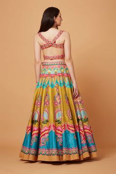 Editor's Note Lime Mustard Paradise Blue Oversized Floral SB Signature Embroidered Lehenga, Bustier Cut Blouse With Powder Pink Net 3D Embroidered Scallop Dupatta. Fabric: Dupion, Net Color: Lime Mustard, Blue Care: Dry Clean Only Disclaimer: Product Color May Slightly Vary Due To Photographic Lighting Sources Or Your Monitor Setting. About the Designer Siddhartha Bansal, label epitomise its design philosophy touring around " Golden bird" nation to present day India, in the wanderlust for rich C Lehenga Pattern, Blue Lehenga, Embroidered Lehenga, Lehenga Blouse, Blouse Cutting, Yellow Blouse, Net Dupatta, Mandala Pattern, Powder Pink