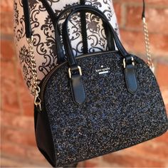 Has Hardly Been Used. In Almost Brand New Condition. No Tags Or Dust Bag. Size 7.4h X 9.5"W X 3.9"D Drop Length: 3" Handheld Total Adjustable Strap Length: 44" Material Made With Rock Glitter With Caviar Pebbled Leather Trim Capital Kate Jacquard Lining Style # Wkru5628 Details Satchel With Zipper Closure Interior Zipper Pocket Removable Shoulder Strap Kate Spade New York Floating Signature Color: Black Luxury Black Sequined Bags, Luxury Glitter Bags For Everyday Use, Elegant Kate Spade Glitter Bags, Kate Spade Crossbody Party Bag, Kate Spade Crossbody Bag For Party, Kate Spade Black Party Bag, Glitter Bag, Leather Trim, Kate Spade New York