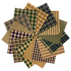 a bunch of different colored plaid fabric on top of each other in various sizes and colors