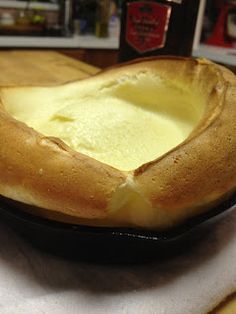 a baked bread dish is sitting on a table