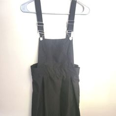 Brand New, Never Been Worn! (Unfortunately Was Way Too Small For Me, Because It Is Adorable!!!) It's A Black, Short, Overall Dress Or Suspender Skirt. You Can Dress It Up, Or Down. Open To Offers! ***Really Hope I Can Give This Amazing Dress To Someone It Actually Fits So That They Can Put Some Life Into It. Because Quite Frankly It Is Too Cute To Be Sitting In A Closet! Casual Black Cotton Pinafore Dress, Black Cotton Pinafore Dress For Spring, Black Sleeveless Pinafore Dress For Spring, Fitted Black Pinafore Dress For Spring, Black Cotton Pinafore Dress For Summer, Casual Fitted Black Pinafore Dress, Black Sleeveless Pinafore Dress For Summer, Spring Black Pinafore Dress For Work, Black Spring Pinafore Dress For Work