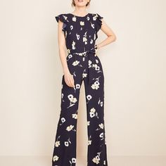 Ann Taylor Sunny Poppy Belted Jumpsuit In Night Sky. Pleated Front Detail Ruffle Cap Sleeve Belted Hidden Back Zip With Keyhole Hook Closures Lined 100% Polyester Soft And Feminine Print. Size 10 Nwt Floral Print Jumpsuits And Rompers For Spring Workwear, Chic Floral Print Jumpsuits For Work, Chic Floral Jumpsuits And Rompers For Work, Elegant Floral Print Jumpsuits And Rompers For Work, Elegant Floral Print Jumpsuits For Work, Black Strapless Jumpsuit, Navy Blue Romper, Black Romper Shorts, Soft And Feminine