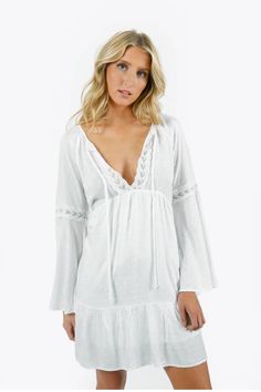 Carmilla White Lace Trimmed Bell Sleeve Babydoll Dress https://www.tobi.com/product/79637-tobi-carmilla-lace-trimmed-bell-sleeve-babydoll-dress?color_id=113489&utm_source=pinterest&utm_medium=social&utm_campaign={campaignid}_{adgroupid}_{product_id} Bell Sleeve Mini Dress, Little White Dress, Weekend Brunch, Casual Weekend, Little White Dresses, On Sneakers, First Date, Rayon Fabric, Fall Shopping