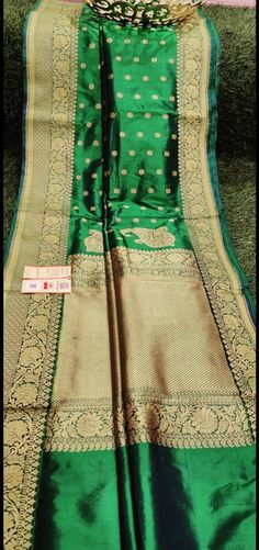 1.this is beautiful pure exclusive handloom banarasi katan silk sari with running blouse piece 2.this sari is 5.5 mt length  3.this sari is very elegant looking sari for all occasions like weddings and other formal events  4.fall n pico is complimentary  5.blouse can be made as per the requirements of the clients with proper measurements.stiching charges will be extra  6.plz check the availability of the sari before placing the order Banarasi Silk Pre-draped Saree With Zari Weaving, Designer Paithani Silk Pre-draped Saree For Festivals, Navratri Katan Silk Pre-draped Saree With Meenakari, Designer Handloom Paithani Silk Pre-draped Saree, Pre-draped Tussar Silk Saree With Meenakari For Festivals, Green Dola Silk Saree For Puja, Katan Silk Pre-draped Saree With Zari Weaving For Navratri, Festival Katan Silk Pre-draped Saree With Cutdana, Green Pre-draped Saree With Zari Weaving In Dola Silk