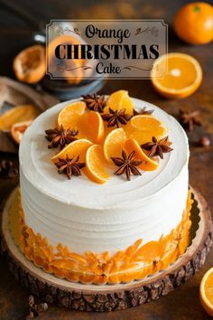 Orange-themed Christmas cake topped with slices and star anise on a rustic wooden base. Winter Cake Flavors, Orange Spice Cake Recipe, Orange Christmas Cake, Orange Desserts, Orange Spice Cake, Easy Christmas Cake Recipe, Christmas Cake Recipe, Spice Cake Recipes, Orange Chocolate Cake