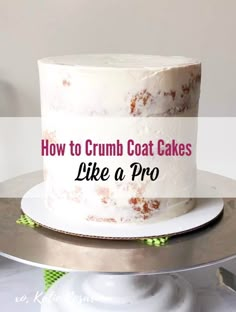 a white cake with the words how to crumb coat cakes like a pro on it