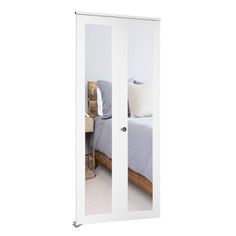 an open sliding glass door with white frame and clear glass on the inside of it