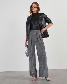 Introducing: your new favorite trousers! The Meet And Greet Lurex Knit Trouser Pants are perfect for when you want a bit of sparkle and shine but need to keep it professional and polished. Complete with front pleats and a flattering, wide-leg fit, we love this pair with solid, mock neck tops. High rise Fitted waist Front pleats Wide leg fit No pockets, closures or lining 70% Nylon 25% Lurex 5% Spandex Runs Small Chic Glitter Bottoms For Evening, Chic Glitter Bottoms For Fall, Fall Evening Glitter Pants, Winter Party Wide Leg Bottoms, Metallic Bottoms For Winter Night Out, Metallic Bottoms For Night Out In Winter, Winter Party Pants With Straight Leg, Straight Leg Pants For Winter Party, Full Length Pants For Winter Evening