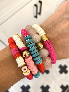 "This listing is for ONE Bracelet. Each bracelet is hand-beaded with African clay and turquoise discs, and accented with a gold plated bead. The bracelet is made with stretch elastic which makes it comfortable and easy to wear. My bracelets are made to fit an average wrist size of 6.5\"-7\". Take a look around my shop for additional colors to add to your stack! The more the better! I'm providing pictures to give you options for what to wear with it." Turquoise Stretch Bracelet With Stackable Round Beads, Turquoise Stackable Stretch Bracelet With Round Beads, Turquoise Stretch Bracelet With Round Beads, Turquoise Stretch Bracelet With Colorful Beads, Turquoise And Pink, Clay Bracelet, Rose Quartz Bracelet, Rainbow Bracelet, Cross Bracelet