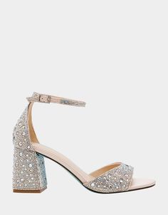 The sparkly KAMI block heel is a flirty open-toed sandal glistening all over with rhinestone embellishments. These short sparkly heels are ideal for any formal occasion or a night out on the town. The sleek mid-low short kitten heels feature a comfortable and stable block heel with an adjustable ankle strap that will keep you dancing all night long. Satin upper with stone ornamentation Adjustable ankle strap with buckle closure Synthetic lining Synthetic Betsey Blue sole 3 inch heel height Imported Stable Block, Sparkly Heels, Rhinestone Embellishments, 3 Inch Heels, Women's Heels, Heel Sandal, Blue Jewelry, Sneaker Heels, Dear Santa