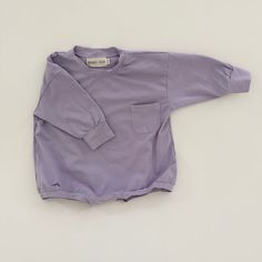 Harley Pocket Romper in Purple Long Sleeve Bodysuit For Playtime, Cotton Jumpsuits With Side Pockets For Loungewear, Long Sleeve Bodysuit For Playtime In Fall, Long Sleeve Bubble Romper For Spring Playwear, Cotton Bodysuit For Loungewear, Casual Long Sleeve Bubble Romper For Spring, Cotton Long Sleeve Jumpsuits And Rompers For Playwear, Spring Casual Long Sleeve Bubble Romper, Spring Long Sleeve Onesie For Loungewear