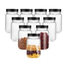 six glass jars filled with different types of food in each one, and the lids are black