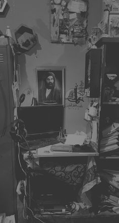 a black and white photo of a messy room