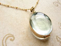 Oval beveled glass locket necklace personalized by soradesigns Elegant Oval Link Jewelry For Gifts, Elegant Locket Necklace As Gift, Elegant Locket Necklace For Gift, Personalized Dainty Oval Jewelry, Dainty Oval Personalized Jewelry, Dainty Personalized Oval Jewelry, Gold Oval Cabochon Jewelry Gift, Gold Oval Cabochon Jewelry As A Gift, Personalized Oval Link Locket Necklace As Gift