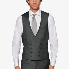 This double-breasted dark grey waistcoat is tailored slim with a rear adjustment strap and jetted pockets. Elegant Fitted Double-breasted Vest, Gray Double-breasted Suit For Business, Gray Double-breasted Business Suits, Elegant Double-breasted Formal Vest, Elegant Formal Double-breasted Vest, Classic Gray Vest For Work, Gray Double-breasted Formal Suit, Gray Fitted Double-breasted Suits, Classic Gray Formal Vest