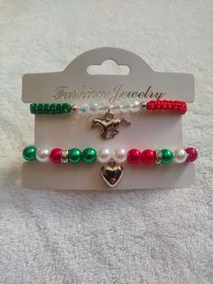 2 Mexico themed bracelets for Cinco de mayo or independence Day. Comes in packaging with stickers and wire hair tie along with all other shop orders. Themed Bracelets, Hair Tie, Charm Bracelets, Columbus, Hair Ties, Independence Day, Jewelry Bracelets, Charm Bracelet, Fashion Jewelry