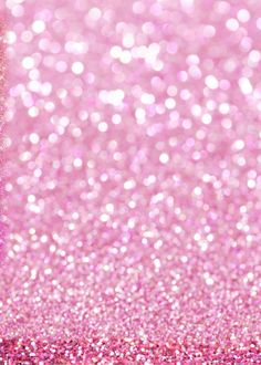 a pink glitter background with lots of sparkle