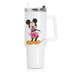 the mickey mouse travel mug is white and has a pink heart on it's side