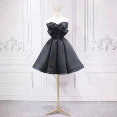 Black fashion homecoming dress, bow tie birthday party dressMaterial:satinColor:as picture or custom colorNeckline:straplessBack details:bandageStyle:fashionDress type: A-line&ltp&gtFeatures: bowknot</p>&ltbr/>&ltp&gtCustomized service and Rush order are available.</p>&ltbr/>&ltp&gtThis dress could be custom made, there are no extra cost to do custom size and color.</p>&ltbr/>&ltp&gtPlease leave your phone number for shipping Black Strapless Dress With Bow Tie Back, Black Strapless Dress With Bow For Party, Black Strapless Dress With Bow For Evening, Satin A-line Strapless Dress For Banquet, Strapless Evening Dress With Bow For Cocktail, Strapless Bow Dress For Party, Prom Dress With Bow For Party Season, Fitted Black Strapless Dress With Bow, Strapless Prom Dress With Bow Tie Back