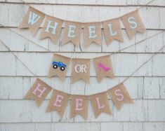 there is a sign that says wheels or heels on the side of a building with bunting