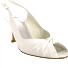 Never Worn-New In A Box With Tags. Stuart Weitzman Satin Sling Backs.... Perfect For Summer Soire Or Dress Up With Stockings For Holidays. Retails For Over $300 I Can Get Them For A Fraction Of The Price Here Formal White Wedding Shoes With Leather Sole, Classic Wedding Shoes With Padded Heel, Classic Formal Wedding Shoes With Heel Strap, Formal White Wedding Shoes With Removable Insole, Elegant White Wedding Shoes, Medium Width, Classic White Open Toe Wedding Shoes, Classic Cream Wedding Shoes For Formal Occasions, Silver Strappy Sandals, Velvet High Heels