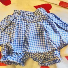 Cute Little Poofy Gingham Skort With A Bow On The Front And Back Shirring For Comfort! Perfect For A Kawaii Outfit On Its Own, But Just As Great For Lounging, Sleeping, Or Wearing Under Something Else For Modesty. These Are New With The Tag From A Small Chinese Brand Bought Directly From The Chinese-Only Shopping Site, Taobao. They Were Only Removed From The Package For Pictures. Us Size Xs-S. Playful Blue Ruffled Bottoms, Cute Light Blue Cotton Bottoms, Blue Cotton Bloomers With Ruffles, Blue Ruffled Bloomers For Summer, Summer Blue Ruffled Bloomers, Casual Ruffled Bottoms For Picnic, Cute Gingham Shorts For Spring, Cute Blue Summer Bloomers, Blue Short Bloomers For Summer