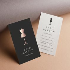 a business card with an image of a mannequin on it