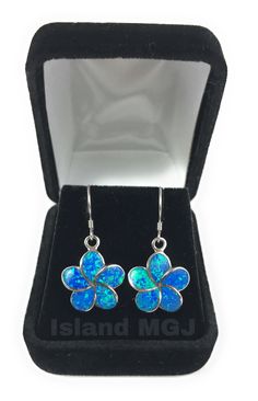 Blue Opal Plumeria Earring 15mm size Solid 925 Sterling Silver Plumeria Earring with Blue Opal set within the piece. Beautiful and elegant piece. Hook style Dangle earring. Every order comes with a gold gift box. Free shipping on every order. Sterling Silver Flower-shaped Jewelry With Matching Earrings, Sterling Silver Flower-shaped Earrings, Blue Flower-shaped Jewelry With Flower Charm, Blue Flower-shaped Sterling Silver Earrings, Blue Sterling Silver Flower Earrings For Pierced Ears, Blue Sterling Silver Earrings With Flower Charm, Blue Flower Sterling Silver Earrings, Sterling Silver Flower Earrings For Gifts, Sterling Silver Flower Earrings As Gift