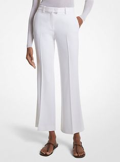 Our coveted Haylee trousers return with a seasonal update for spring. Crafted in Italy from double crepe sablé, this elevated pair is sharply tailored with flared legs and an above-the-ankle hem to create a streamlined silhouette. Finished with side pockets and crisp pleats down the front, they look especially chic paired with sleek sandals and a cashmere sweater or blazer. Elegant Spring Pants In Elastane, Elegant Spring Pants, Elegant Flare Bottoms With Pressed Crease, Elegant Wide Leg Flared Pants, Elegant Fitted Pants With Flared Cuffs, Elegant Flared Pants With Pressed Crease, Elegant Wide Leg Pants With Pressed Crease For Spring, Elegant Spring Wide Leg Pants With Pressed Crease, Elegant Fitted Bottoms With Flared Cuffs