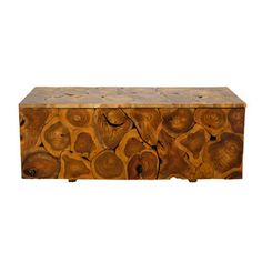 a wooden box that has been carved with wood slices on the front and sides,