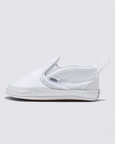 Infant Slip-On V Crib Shoe Vans Sneakers With Textured Sole For Spring, Vans Slip-ons With White Sole And Round Toe, Vans Slip-ons With Round Toe And White Sole, White Slip-ons For Spring Streetwear, White Non-slip Low-top Slip-ons, White Synthetic Canvas Shoes With Textured Sole, Vans Slip-on Sneakers For Spring, White Vans Slip-ons With Round Toe, Spring Sneakers With Soft Sole And Closed Toe