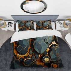 a bed with a mirror on the wall next to it and two pillows in front of it