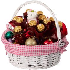 a basket filled with chocolates and a stuffed animal