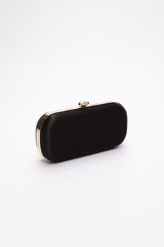 The Black Bella Clutch is a duchess satin designer bridal and evening clutch, perfect for a divine, fancy black-tie occasion on your calendar! The Black Bella Clutch makes a statement! Designed with a contemporary vision, the Black Bella Clutch is made of duchess satin and crafted by the finest Italian artisans. The perfect accessory to complete a refined and glamorous black-tie outfit, The Black Bella Clutch will become a staple in your wardrobe. Paired best with silver hardware! The Bella Clut Glamorous Formal Clutch Evening Bag, Elegant Evening Bag For Party, Formal Satin Evening Bag With Satin Lining, Glamorous Formal Evening Bag, Satin Clutch Evening Bag For Events, Elegant Evening Clutch Bag, Classic Evening Bag For Parties, Elegant Rectangular Evening Bag For Events, Elegant Evening Bag For Events