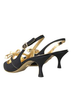 The autumn-winter collection includes the Lori slingback pumps, featuring kitten heels and elegant embellishments, highlighted with a narrow gold nappa piping on the edges. Noticeably, the vamp strap is adorned with large sparkling crystals and a voluminous bow in a matching material. Suede embellished slingback heels shoes. Model: Slingback heels Color: Black, Gold Material: 51% Silk 49% Leather Buckle closure Leather bottom sole Made in Italy Formal Evening Slingback Pumps, Elegant Low Heel Kitten Heels For Evening, Luxury Low Heel Slingback Pumps For Party, Elegant Evening Kitten Heels With Heel Strap, Designer Gold Slingback Pumps For Evening, Elegant Kitten Heels With Heel Strap For Gala, Designer Low Heel Slingback Pumps For Party, Elegant Slingback Pumps For Cocktail, Elegant Slingback Pumps For Cocktail Occasions