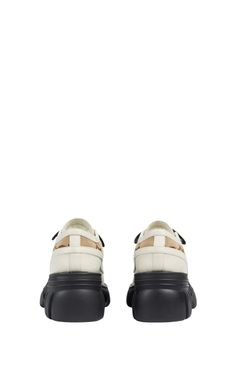 This pair of women's lace-up shoes is presented in a refined mix of white leather and monogram canvas. A lug sole White leatherCamel and ebony GG canvas trimRubber soleLace-up closureBlock heel: 1.5"Platphorme: 1"Made in Italy Gucci White Sneakers With Textured Sole, Gucci Sneakers With Textured Sole And Round Toe, Gucci Leather Sneakers With Rubber Sole, Gucci Designer Platform Sneakers With Round Toe, Designer Gucci Platform Sneakers With Round Toe, Luxury Leather Platform Sneakers With Studded Outsoles, Gucci Leather Low-top Platform Sneakers, Casual Gucci Platform Sneakers With Round Toe, Gucci Low-top Platform Sneakers With Branded Insole