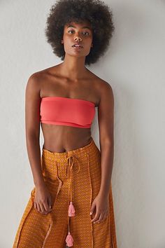 This essential tube bandeau is part of our Neo Collection. The fabric marries our signature scuba-inspired material (think: blissfully supportive neoprene) with a natural, barely-there feel. * Stretch fit * Pull-on style * Elastic hems | Nina Neo Bandeau by Intimately at Free People in Orange, Size: XL Versatile Tube Top For Beach, Versatile Tube Top For The Beach, Seamless Strapless Tube Top For Beachwear, Seamless Bandeau Tube Top For Summer, Stretch Bandeau Tube Top For Vacation, Bandeau Beachwear Tube Top, Seamless Bandeau Tube Top For Vacation, Stretch Beachwear Tube Top For Spring, Stretch Tube Top For Beachwear In Spring