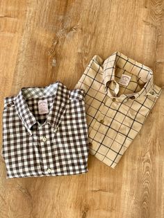 Here are some great, mens button down shirts, both made by Brooks Brothers so needless to say...they are timeless classics! A brown and white check plaid button down, fantastic colors...a perfect Fall shirt no doubt! Tag says Brooks Brothers, XL Madison (shirt style) Measures approximately  Shoulder to hem 32" Armpit to cuff 22" LOVE THIS...a light brown plaid pattern, much like a Burberry pattern. Another perfect Fall button down Tag says Brooks Brothers, M The original polo shirt (shirt style) Classic Plaid Shirt With Buttons, Brown Button-up Everyday Shirt, Brown Button-up Shirt For Everyday, Everyday Brown Button-up Shirt, Brown Everyday Button-up Shirt, Brown Buttoned Flannel Shirt For Work, Brown Flannel Workwear Shirt, Classic Plaid Tops For Casual Gatherings, Brown Cotton Flannel Shirt For Everyday