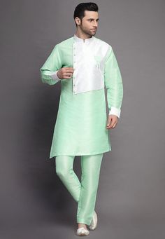 Art Silk Kurta in Sea GreenThis Readymade attire is Enhanced with Buttons. Crafted in Chinese Collar Neck and Full SleeveAvailable with an Art Silk Pant in Sea GreenDo note: Footwear shown in the image is for presentation purposes only. Half to one inch may vary in measurement. (Slight variation in actual color vs. image is possible) We sell all kinds of menswear. Mens Kurta | Mens Kurta Pajama | Mens Sherwani | Mens Sherwani Sets | Traditional Menswear | Partywear Menswear | Indian Mens Dresses Traditional Silk Kurta With Set-in Sleeves, Traditional Sets With Set-in Sleeves For Eid, Traditional Designer Kurta With Set-in Sleeves, White Designer Sets, Silk Kurta With Set-in Sleeves For Wedding, Wedding Kurta With Set-in Sleeves For Eid, Green Designer Wear Sets, Designer Green Long Sleeve Sets, White Silk Long Sleeve Sets