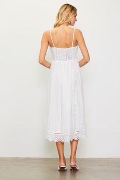 Our dreamy eyelet lace dress has a swoon-worthy silhouette with a sweetheart neckline, nipped-in waist, and scalloped hem. The smocked back and adjustable crisscross straps make for a figure-hugging fit up top. Pack it for your next sun-soaked getaway. •Adjustable straps •Smocked back •Hidden side zipper •Mid-length hem Item Number: 99695 Vacation Dresses Casual, Wedding Guest Dress Trends, Eyelet Lace Dress, Casual Wedding Dress, Lace Midi, Vacation Dresses, Eyelet Lace, Lace Midi Dress, Sweater Sale