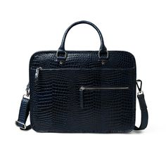 Indulge in trend with our Croco Leather Computer Bag. Made of premium full grain buffalo leather, this Navy blue laptop bag features an elegant croco pattern that is perfect for your everyday work and wear. Keep your computer protected in style, and make a statement with this exclusive piece. Salient features: Handcrafted with full grain buffalo leather Navy on textured leather Sleek and minimalistic look One main compartment to carry all your essentials Small zippered pocket in front Can be eas Business Leather Shoulder Bag With Crocodile Pattern, Leather Shoulder Bag With Crocodile Pattern For Business, Leather Satchel With Crocodile Pattern For Business, Business Leather Bags With Crocodile Pattern, Leather Bags With Crocodile Pattern For Business, Modern Business Shoulder Bag With Crocodile Pattern, Blue Rectangular Laptop Bag For Business, Blue Rectangular Business Laptop Bag, Classic Crocodile Pattern Shoulder Bag For Work