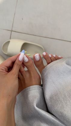 35 White Pedicure Ideas for a Chic Look in 2024 10 White Nails Pedicure Toenails, White On White Pedicure, White French Pedicure Toenails, Milky White Gel Pedicure, January Pedicure Colors 2024, Valentine Pedicure Ideas, White Feet Nails Ideas, Winter Toenails 2023 Trends, White On White French Pedicure