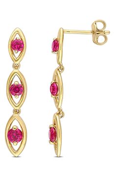 Linear marquise drops add an art deco style to these vibrant, 18K yellow gold plated earrings with dazzling created rubies. 1.2" length Post back 18K yellow gold plated sterling silver, created ruby Wipe clean with soft cloth Imported Ruby Drop Earrings, Ruby Earrings Studs, Oval Earrings, Oval Earring, Fine Jewellery Earrings, Gold Plated Earrings, Elegant Earrings, Gold Plated Sterling Silver, Gemstone Earrings