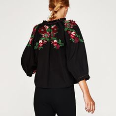 V-Neck Top With Cord Lace-Up Fastening In The Front. Features Long, Voluminous Sleeves, Embroidered Back And Piping At The Cuffs. Composition Outer Shell Body 100% Cotton Embroidery 60% Cotton, 40% Viscose * Exclusive Of Decoration Price Firm. Thanks. Floral Embroidered Top For Workwear, Zara Blouse With Floral Embroidery For Fall, Red Tops With Embroidered Sleeves For Spring, Zara Embroidered V-neck Blouse, Embroidered V-neck Top For Workwear, Chic Embroidered Zara Tops, Zara Embroidered Blouse For Fall, Floral Embroidery V-neck Top For Work, Embroidered Zara Tops For Fall