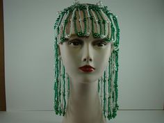 Party it up with this Cleopatra beaded wig! Perfect for costume parties, halloween parties, or any parties!! Product comes in several colors: - Green/Pearl - Red/Pink - Red/Pearl/Blue - Multi Color Available individually, 3-Pack, 6-Pack, & 12-Pack pricing Beaded Wig, Metal Mask, Feather Mask, New Orleans Mardi Gras, Red Pearl, Beaded Hat, Polo Shirt Dress, Mardi Gras Beads, Costume Parties