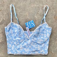 Features: All Over Mini Floral Print On A Baby Light Blue And White Colorway Underwired Cups (No Padding), Adjustable Straps. Scalloped Edges Add To The Overall Vibe Brand New With Tags Still On. Rrp $48. Tagged Size Xs. Summer Light Blue Bra-friendly Top, Blue Fitted Tops With Underwire Support, Blue Summer Bra With Built-in Support, Light Blue Summer Bra, Blue Summer Bra For Vacation, Summer Cotton Bra For Beach, Summer Beach Bra In Cotton, Blue Lace Trim Bra For Spring, Light Blue Underwire Bra For Spring