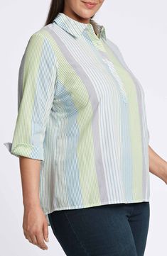 Variegated stripes give you a crisp, polished look in this cotton-seersucker popover shirt featuring a split back and cuffs. 29" length Button half placket Spread collar Three-quarter sleeves with French cuffs 100% cotton Machine wash, line dry Imported Spring Striped Seersucker Tops, Striped Seersucker Tops For Spring, Striped Top With Placket For Daywear, Striped Collar Shirttail Hem Top, Denim Sandals, Popover Shirt, Tunic Sweater, White Shop, Polished Look