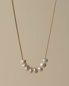 A little string of pearls on a delicate chain gives this necklaces an air of elegance without feeling overdone. Details: Fresh water pearls Stainless Steel 18K Gold Plated Waterproof, hypoallergenic, anti-fading Fresh Water Pearl Necklace, Water Pearl Necklace, String Of Pearls, Fresh Water Pearls, Book Candle, Waterproof Jewelry, Delicate Chain, Water Pearls, Freshwater Pearl Necklaces