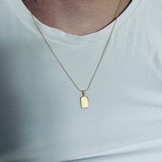 with its small rectangular pendant that can be engraved with up to 4 characters on either side, we think you'll struggle to find someone that doesn't love this gold plated sterling silver necklace! the 14mm x 7mm pendant hangs from a diamond cut curb chain, with length 20inch. item for that special occasion! Rectangular Tag Jewelry For Gifts, Classic Yellow Gold Rectangular Charm Necklace, Classic Rectangular Yellow Gold Charm Necklace, Classic Gold Rectangular Charm Necklace, Minimalist Yellow Gold Charm Necklace With Rectangular Pendant, Classic Engraved Rectangular Charm Necklaces, Classic Rectangular Engraved Charm Necklaces, Classic Yellow Gold Charm Necklace With Rectangular Pendant, Classic Rectangular Charm Necklaces For Everyday